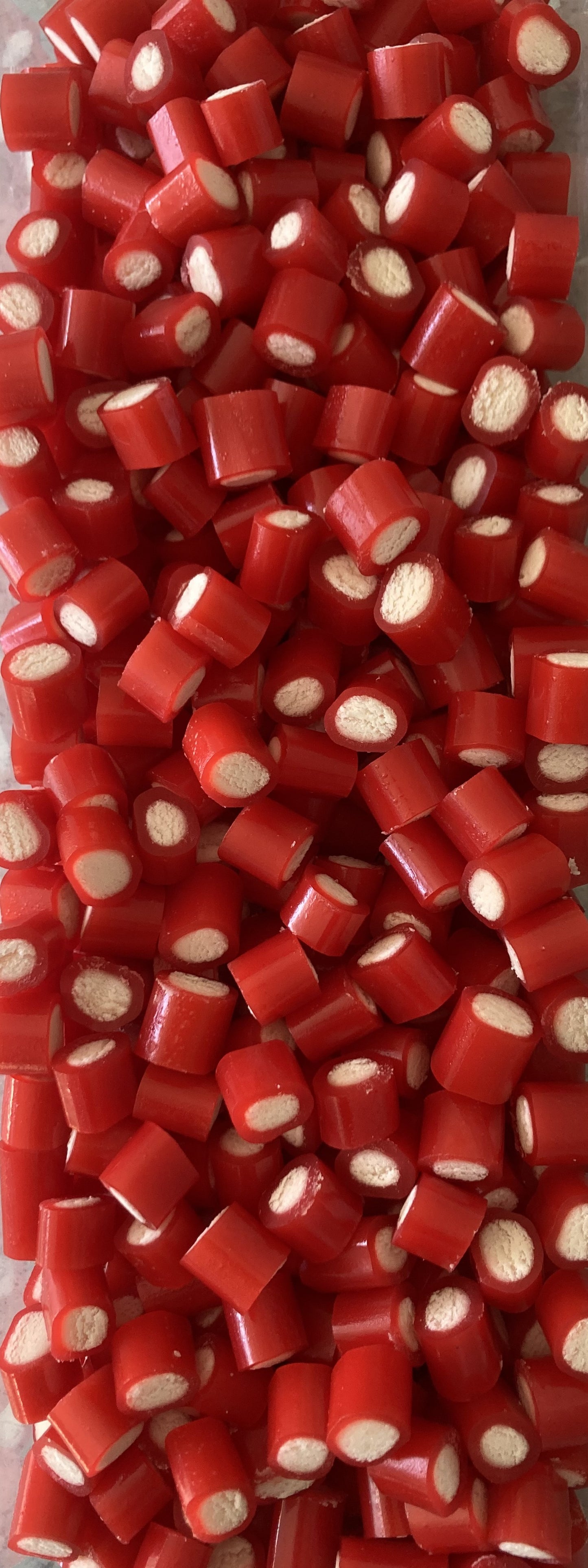 Réf DA 97 - Bonbon aux fruits en forme de Bouchée de Mini câble gout Fraise, Bonbon Halal - Sachet de 100 gr.